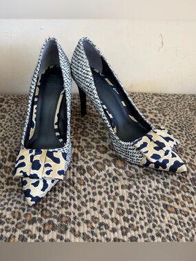 Tory Burch Cleo Tweed Pumps featuring silk bow heels in a navy blue